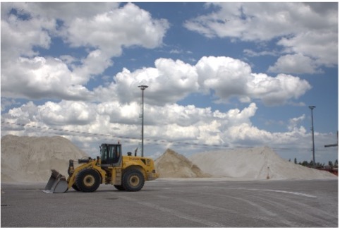 Loader handling processed mineral stockpiles at a DELFI facility